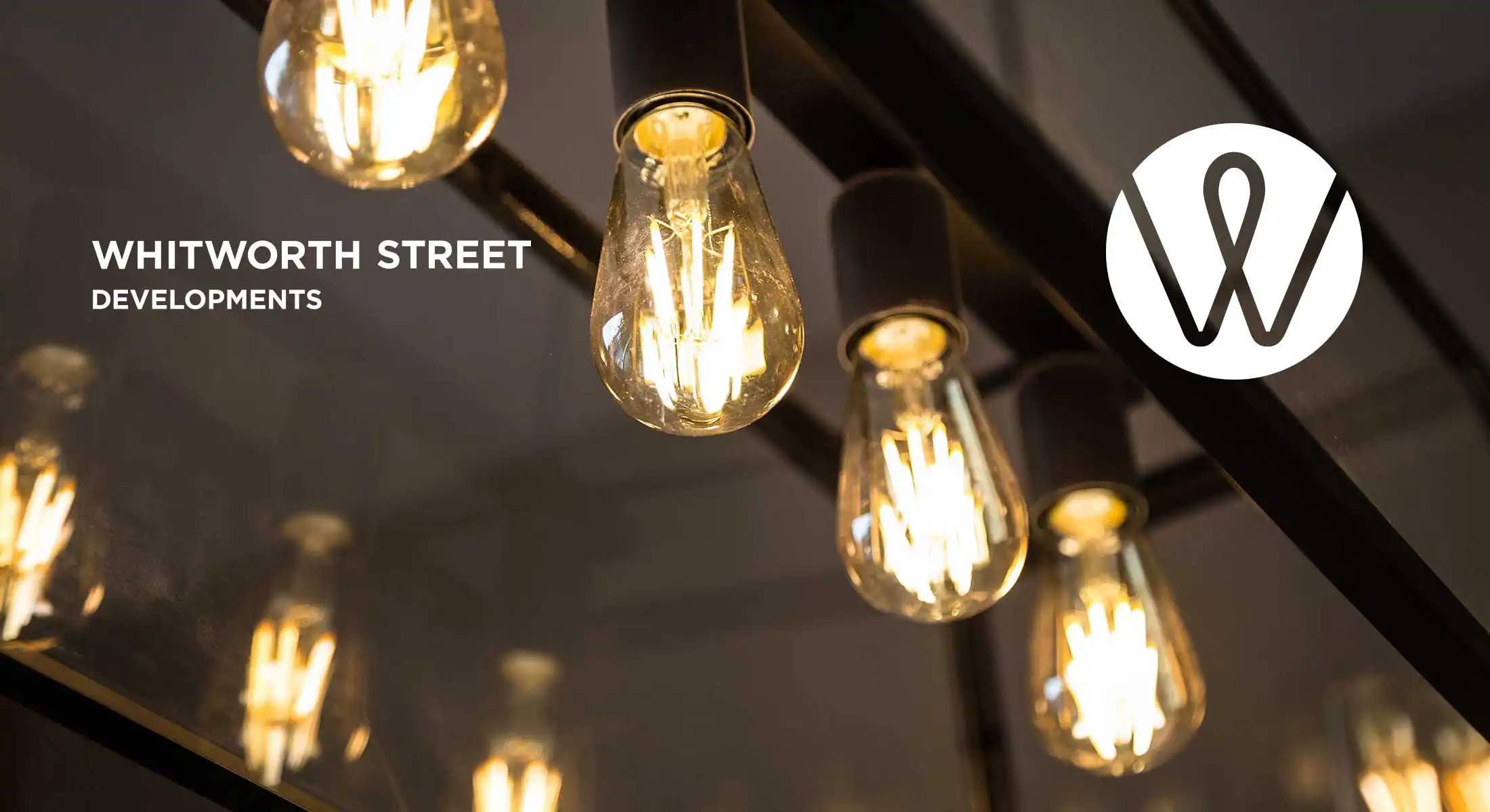 logo overlaid of lightbulb image