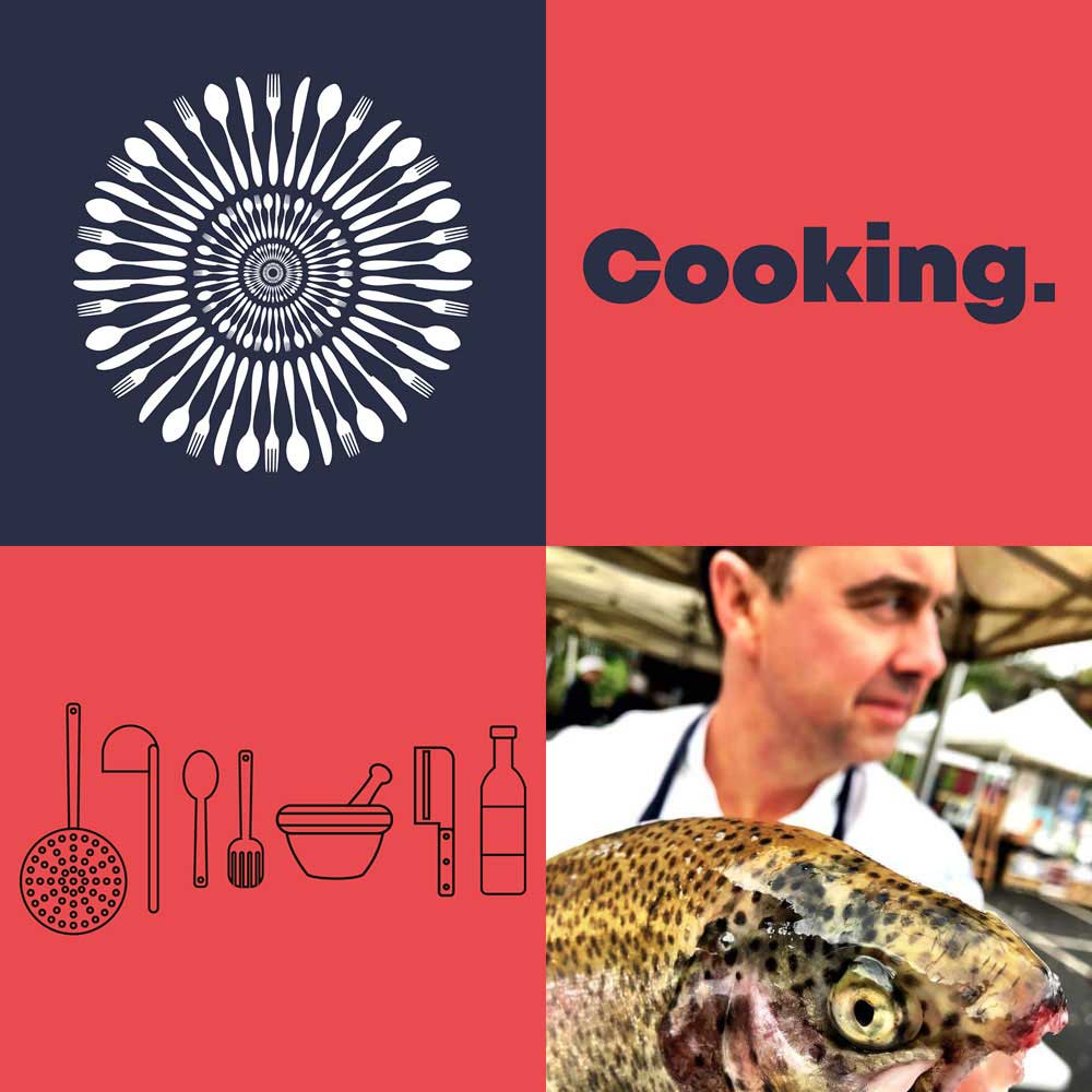 chef holding big fish on market