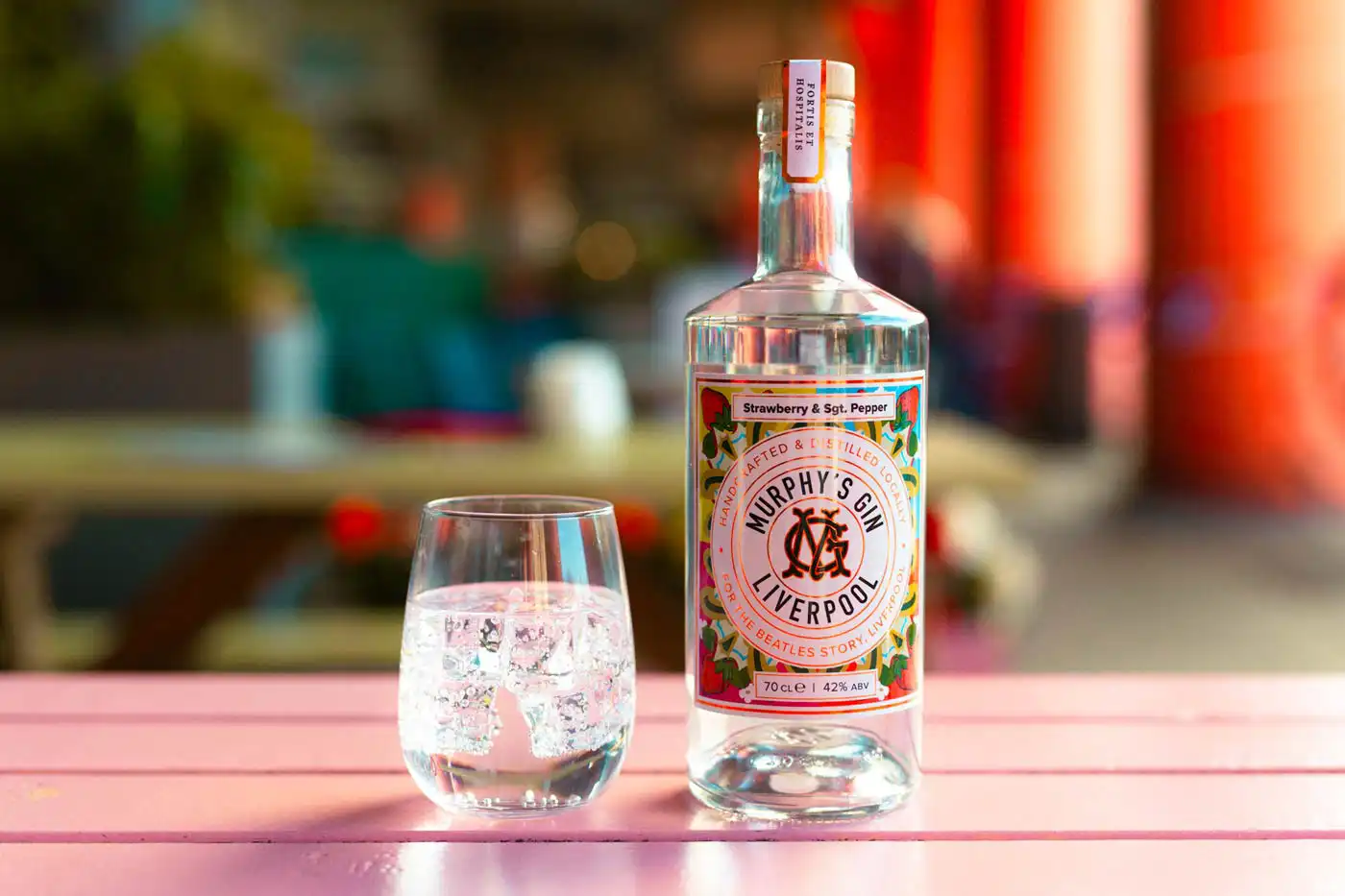 pink hued gin photo of packaging design and illustration by GOTO Creative